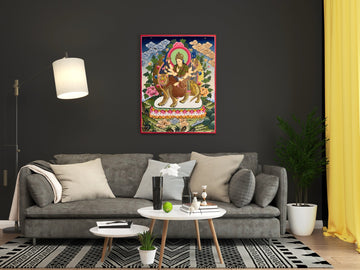 Hand-painted Durga thangka above a grey sofa: the many-armed goddess rides a tiger