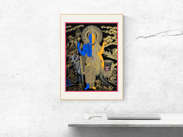 Hand-painted thangka of Shiva and Parvati as one figure, half blue and half gold, with a bull and a lion, framed on a white wall
