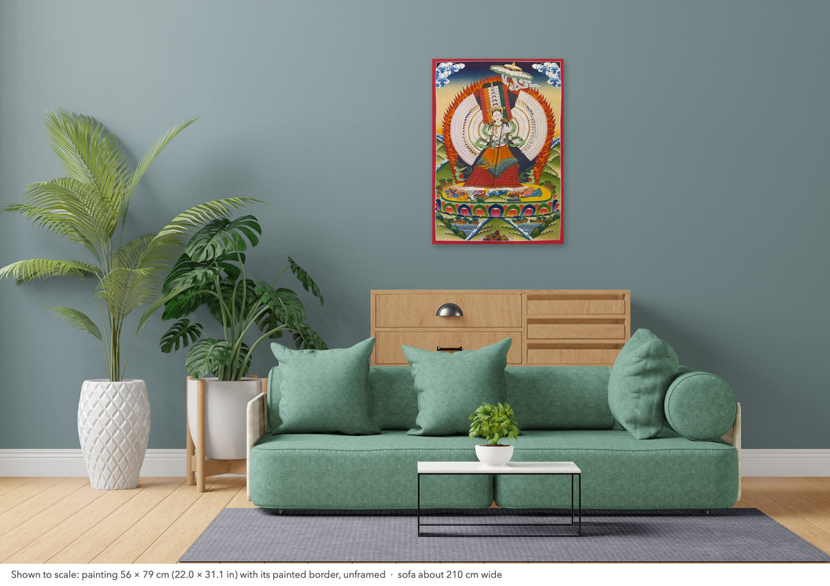 Dukkar thangka shown to scale in a living room, unframed, above a sofa about 210 cm wide (56×79 cm)