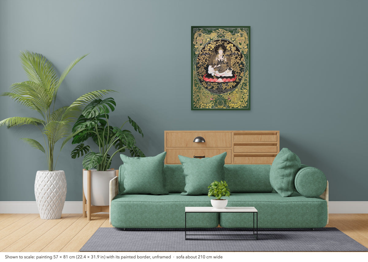 Samantabhadra Bodhisattva thangka shown to scale in a living room, unframed, above a sofa about 210 cm wide (57×81 cm)