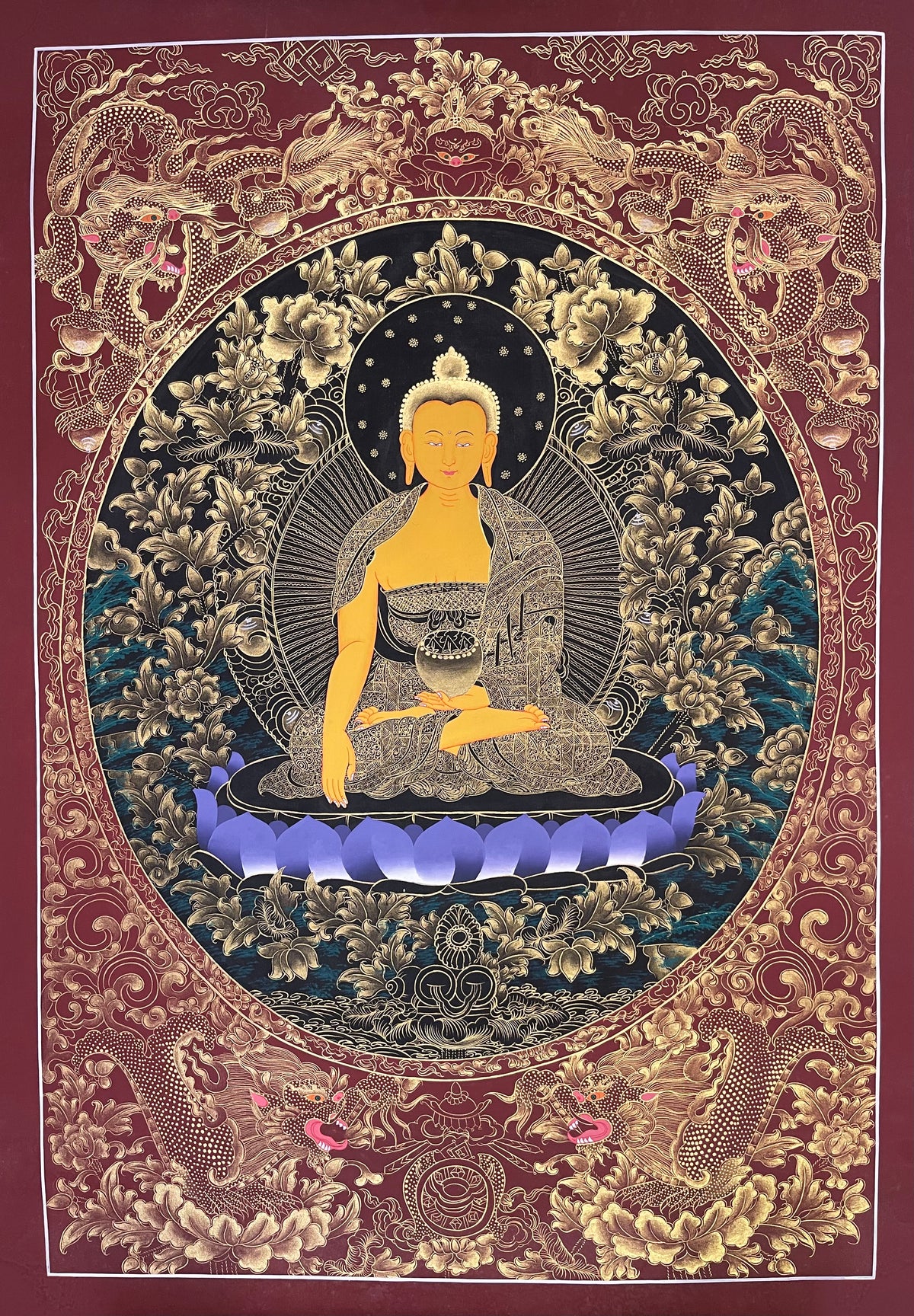 Shakyamuni Buddha thangka, 57×81 cm: Shakyamuni in fine gold-coloured line work on black, framed by four dragons on maroon