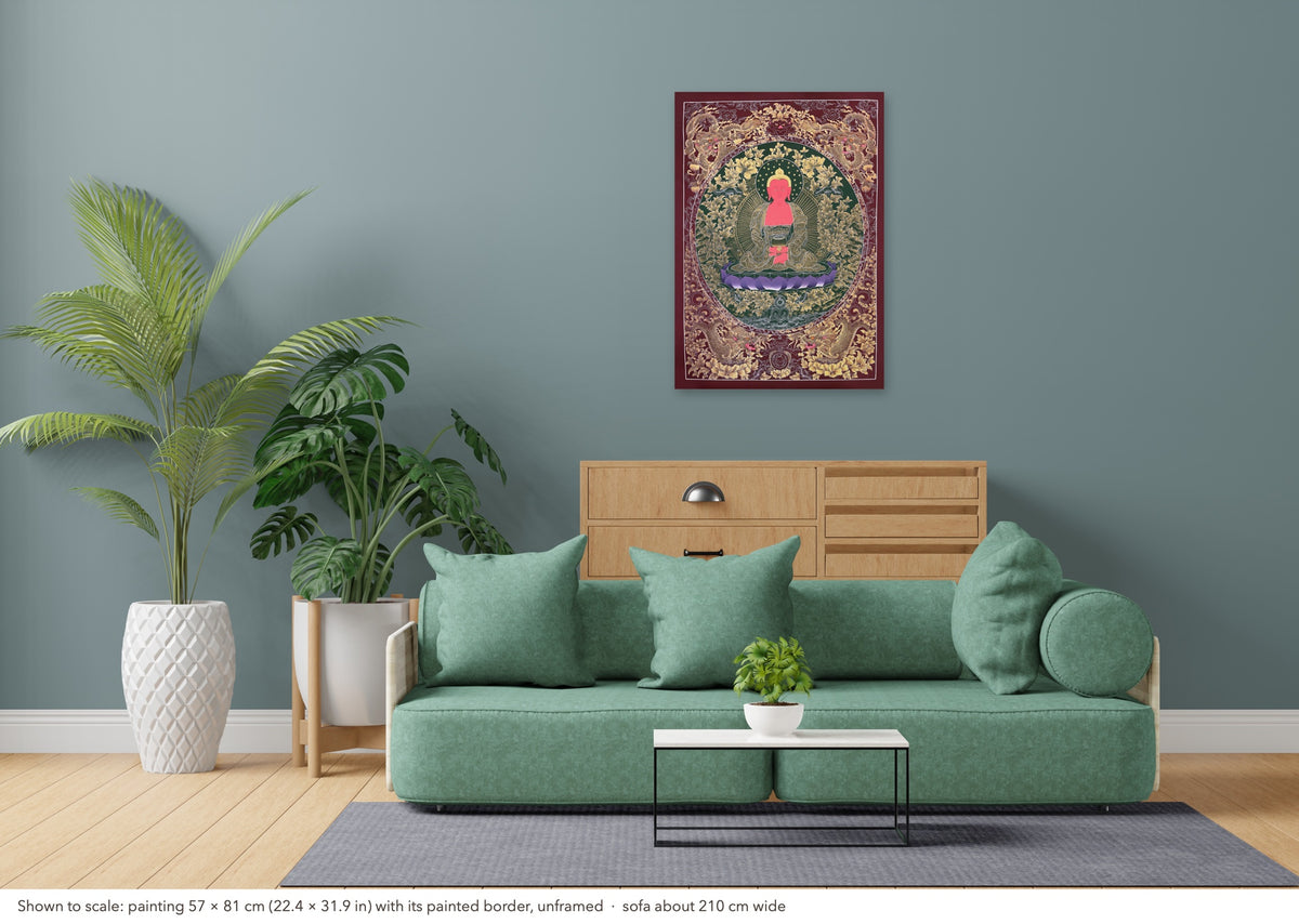 Amitabha Buddha thangka shown to scale in a living room, unframed, above a sofa about 210 cm wide (57×81 cm)