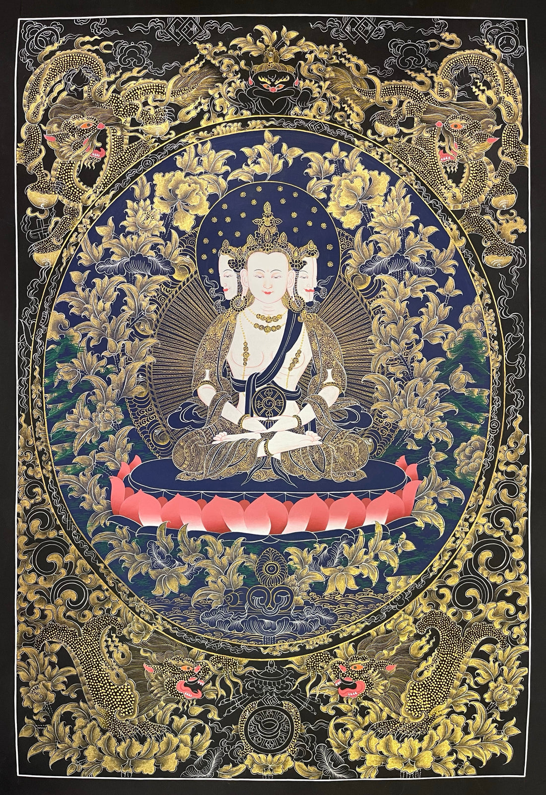Vairocana thangka, 57×81 cm: four-faced white Vairocana with a dharma wheel in fine gold-coloured line work on navy, framed by four dragons