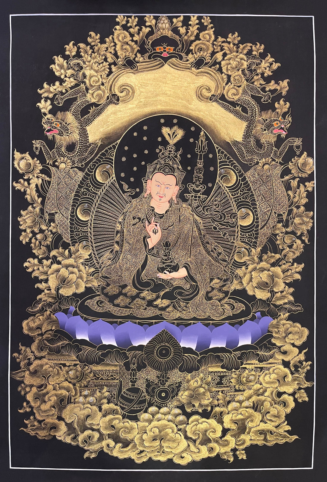 Padmasambhava thangka, 57×81 cm: Padmasambhava on a violet lotus in fine gold-coloured line work on black, framed by dragons