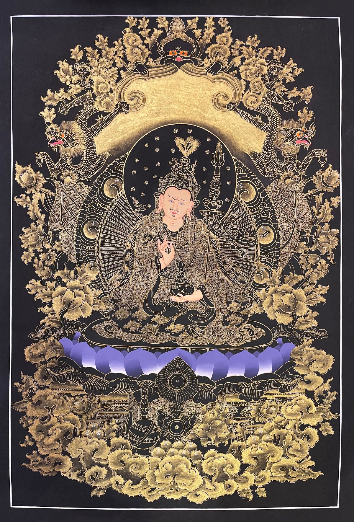 Padmasambhava thangka, 57×81 cm: Padmasambhava on a violet lotus in fine gold-coloured line work on black, framed by dragons