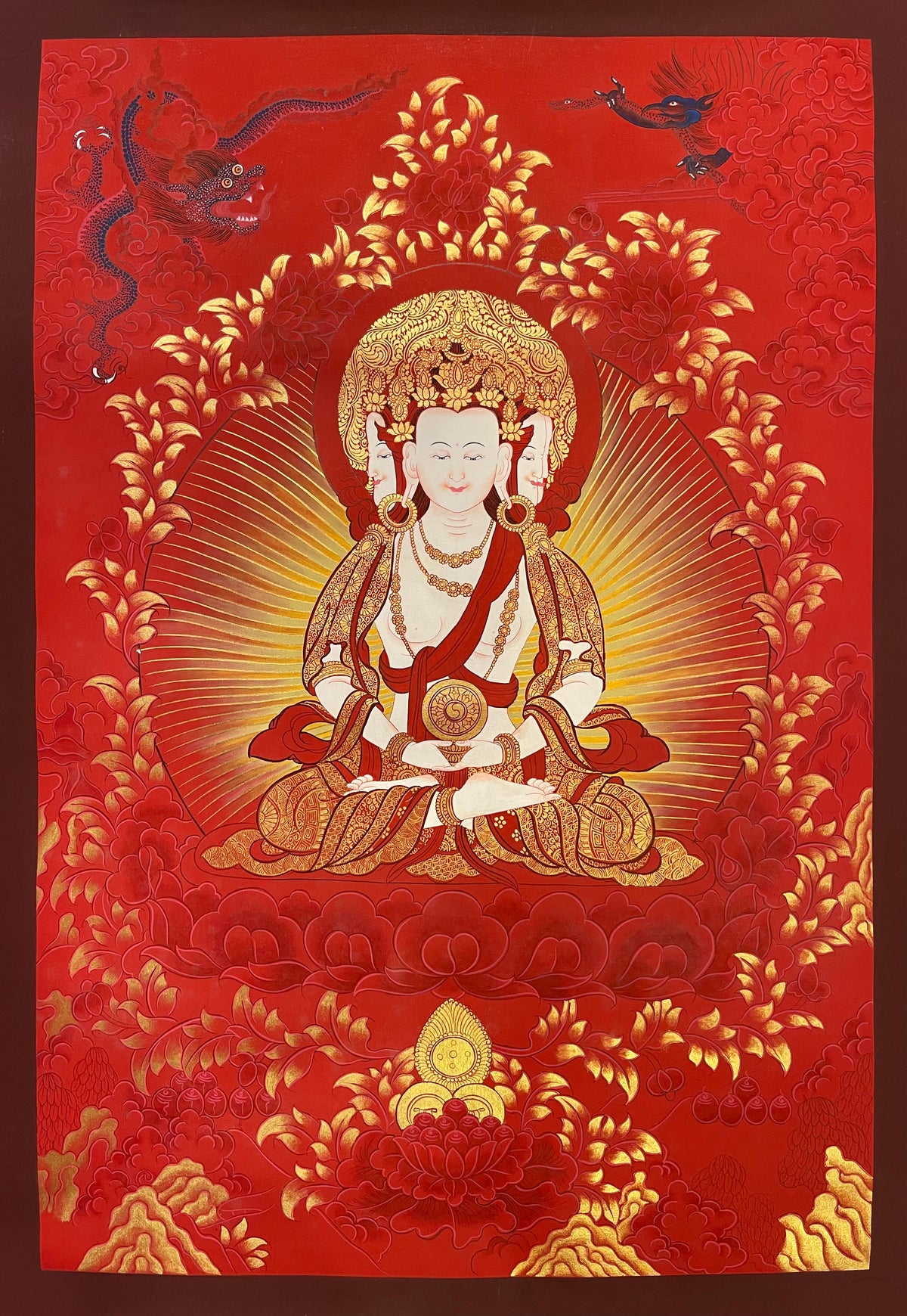 Vairocana thangka, 57×81 cm: four-faced white Vairocana with a dharma wheel, worked in red and gold-coloured highlights