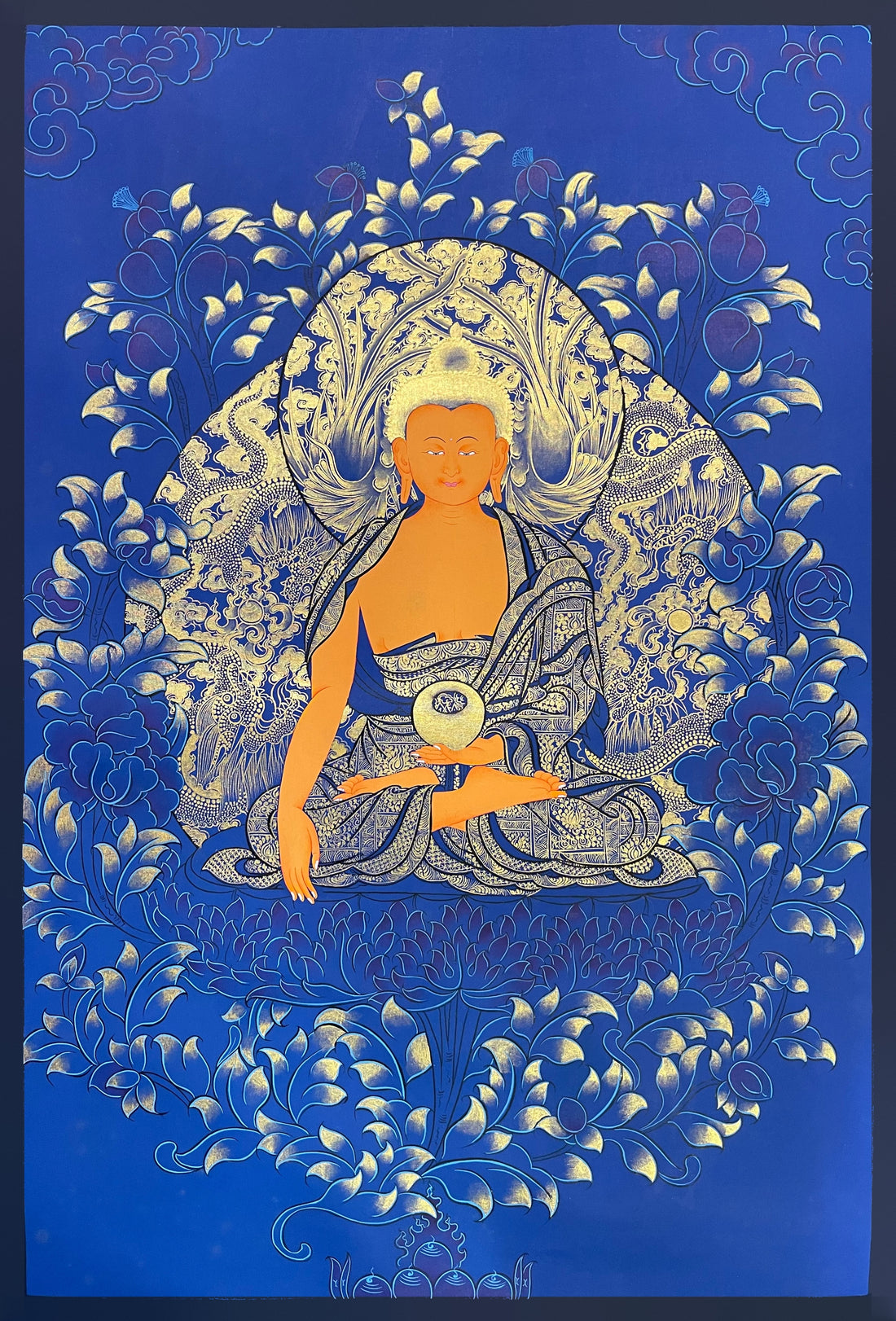 Shakyamuni Buddha thangka, 57×81 cm: Shakyamuni in gold-coloured line work on deep blue, with dragons, phoenixes and peonies
