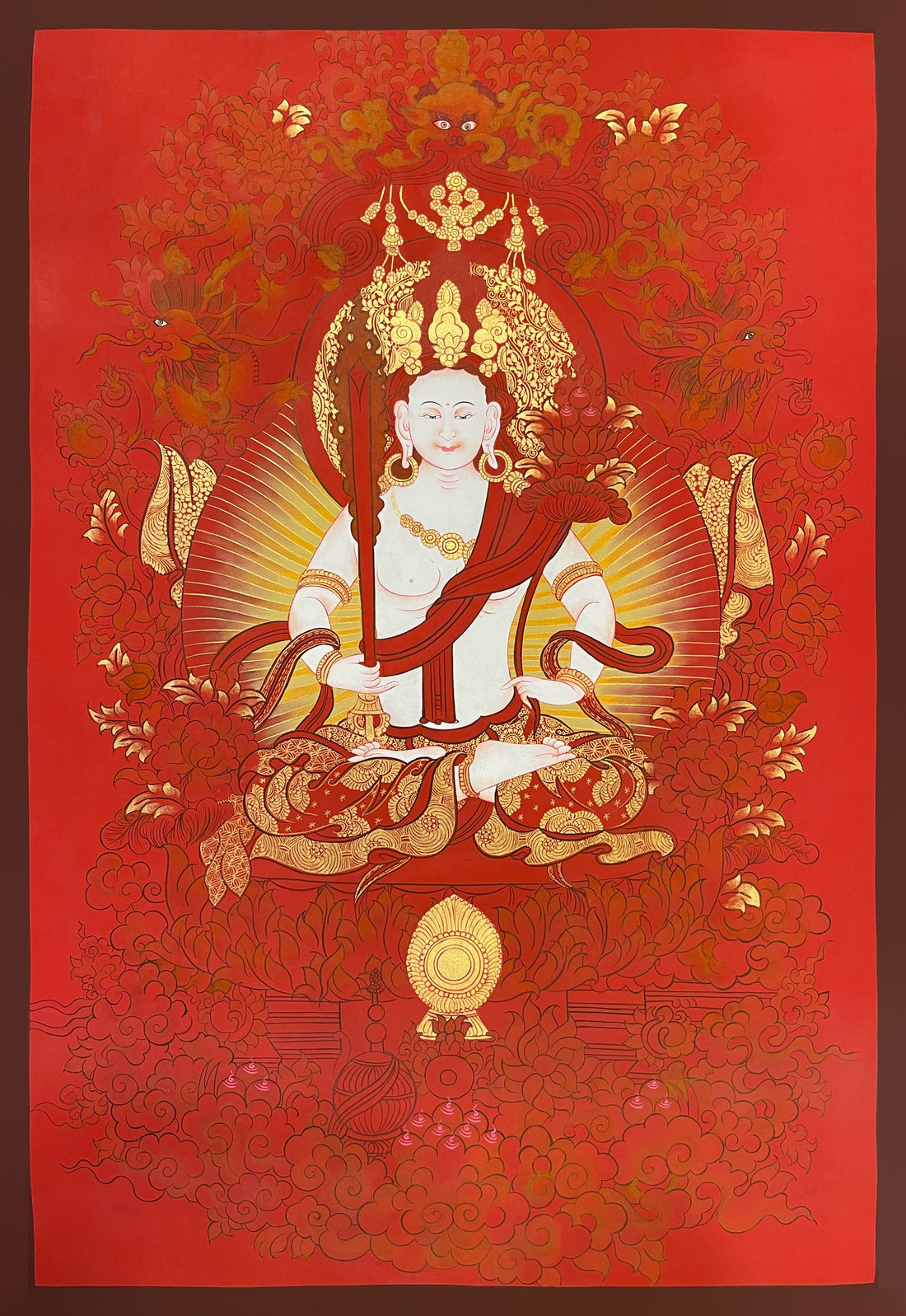 Akasagarbha thangka, 57×81 cm: white Akasagarbha holding an upright sword, with a lotus bearing jewels, on a red ground