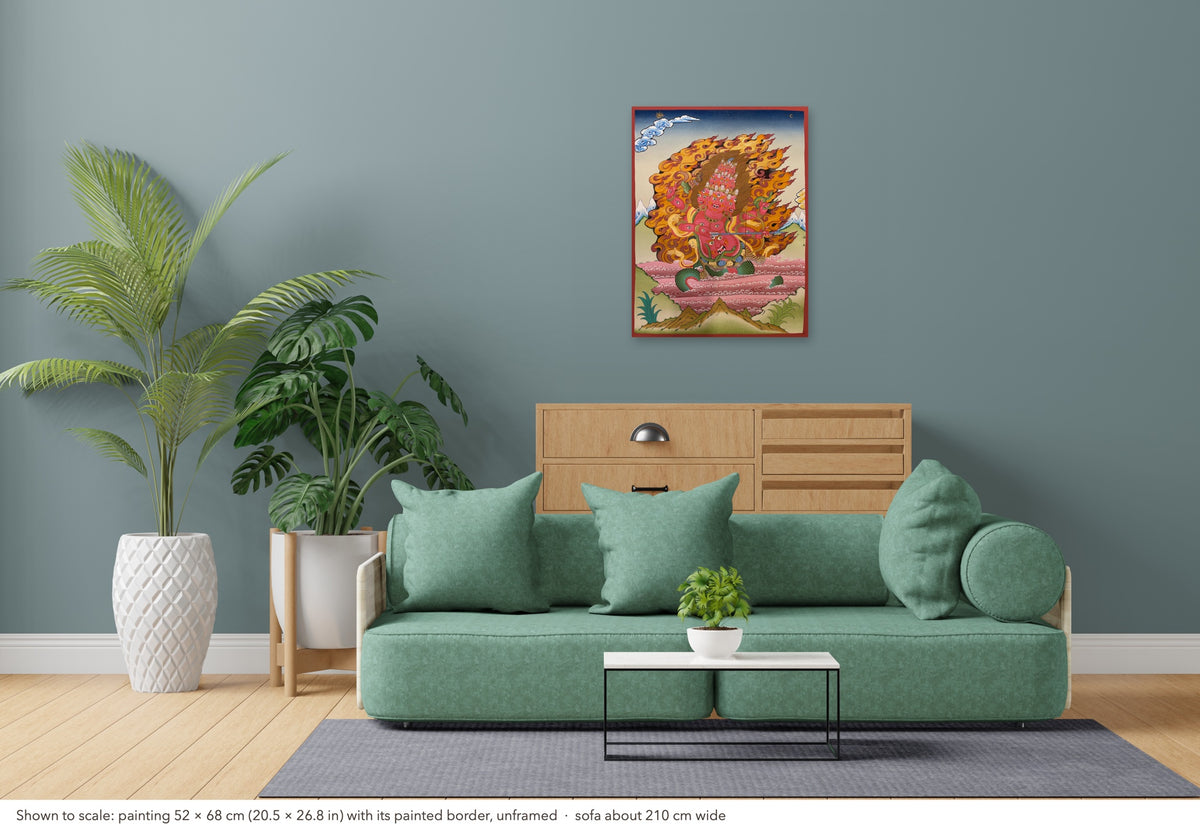 Rahula thangka shown to scale in a living room, unframed, above a sofa about 210 cm wide (52×68 cm)