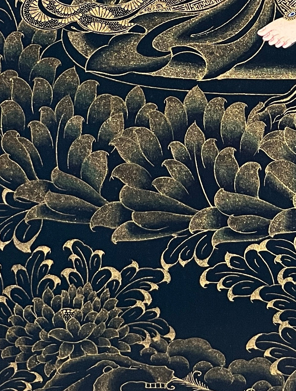 Saraswati thangka, detail: bottom-left corner