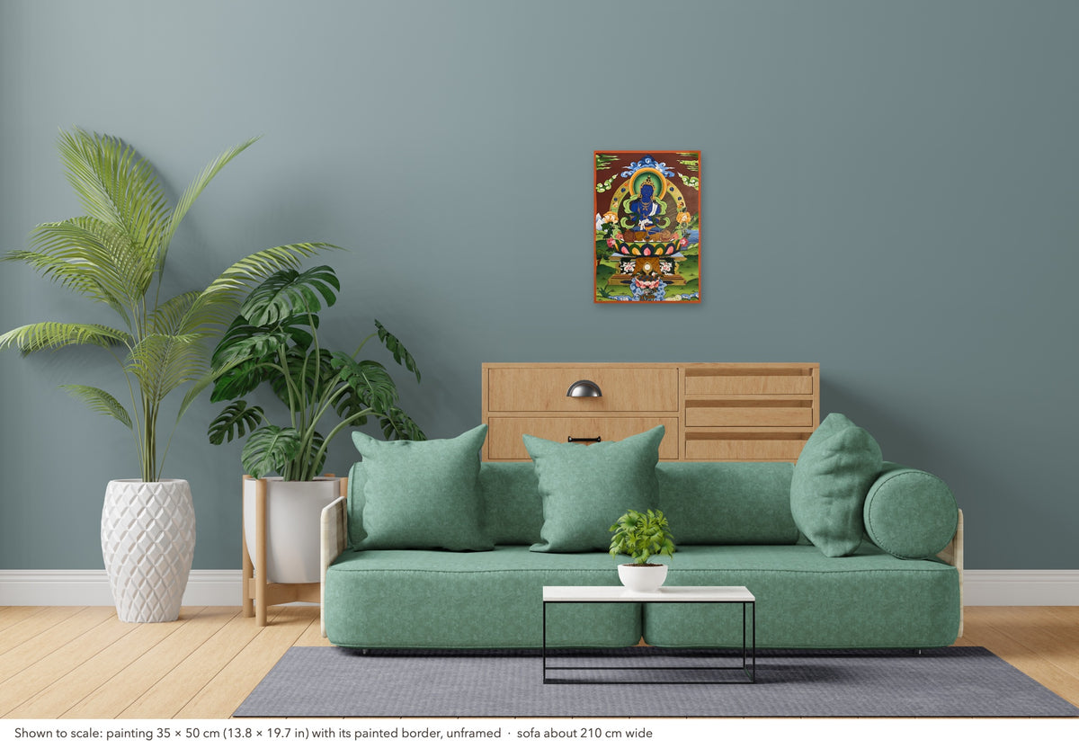 Vajradhara thangka shown to scale in a living room, unframed, above a sofa about 210 cm wide (35×50 cm)