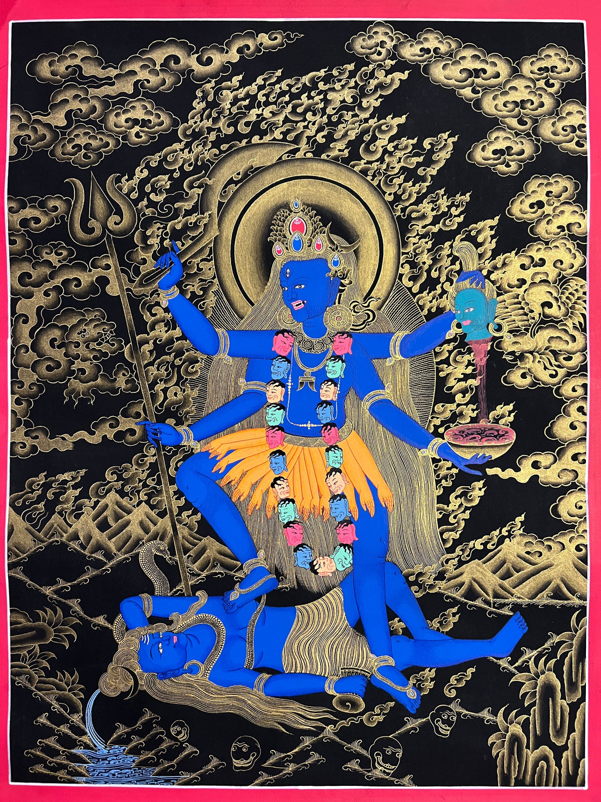 Kali thangka, 45×60 cm: blue four-armed Kali standing on Shiva, in gold-coloured line work on black