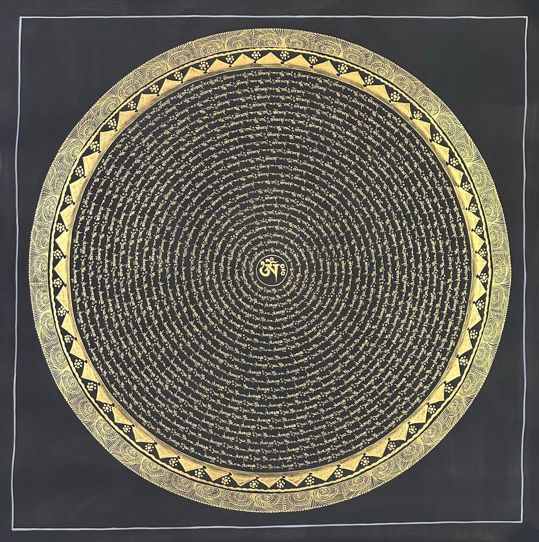 Mantra Mandala thangka, 108×108 cm: concentric rings of gold-coloured mantra script on black around a single Om, with a border of triangles