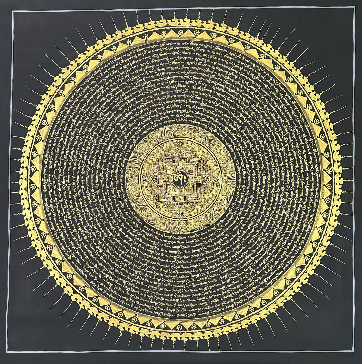 Mantra Mandala thangka, 108×108 cm: rings of gold-coloured mantra script on black around a small palace mandala, with a sun-ray border