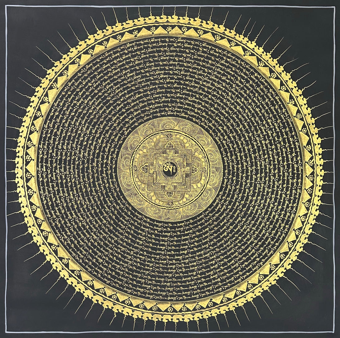 Mantra Mandala thangka, 108×108 cm: rings of gold-coloured mantra script on black around a small palace mandala, with a sun-ray border