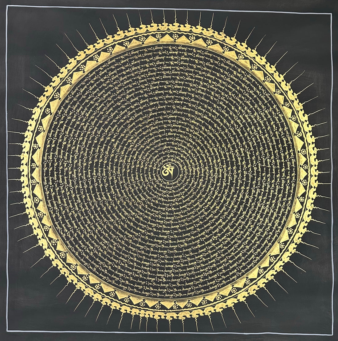 Mantra Mandala thangka, 108×108 cm: rings of gold-coloured mantra script on black around a single Om, with a sun-ray border