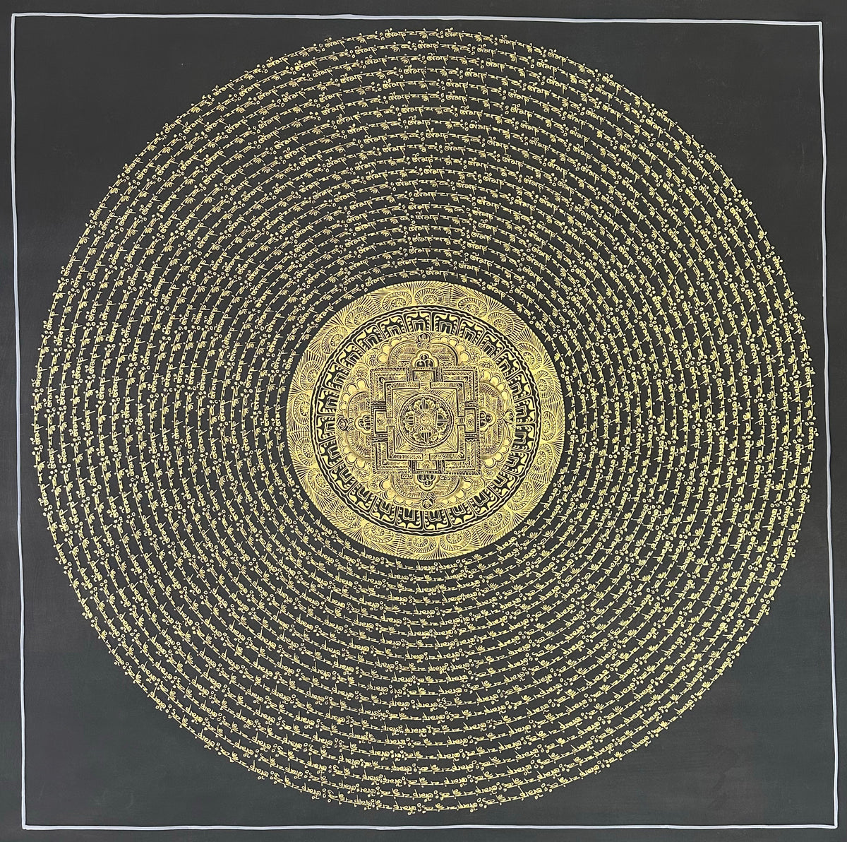 Mantra Mandala thangka, 108×108 cm: open rings of gold-coloured mantra script on black around a small palace mandala with a dharma wheel