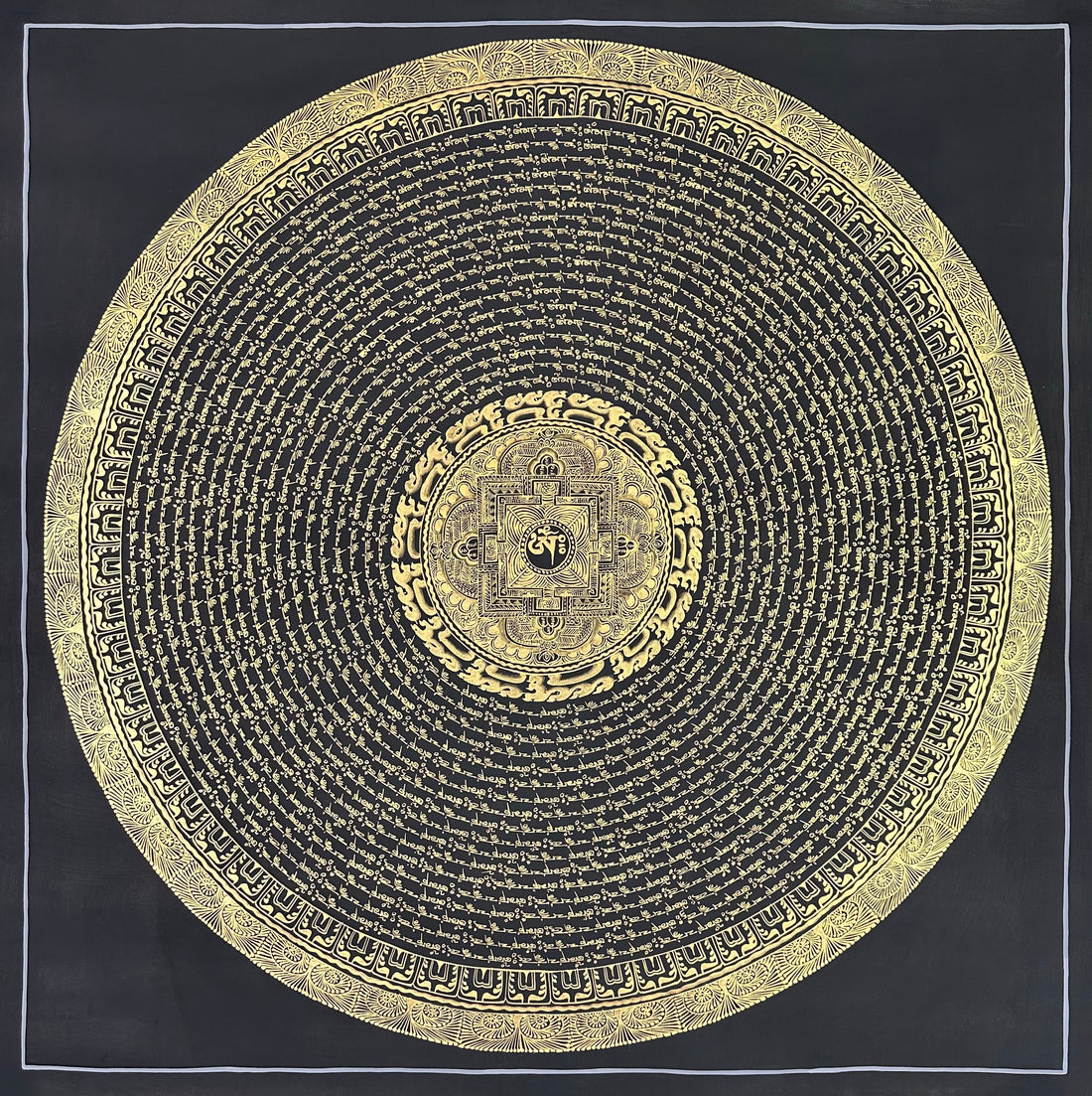 Mantra Mandala thangka, 108×108 cm: rings of gold-coloured mantra script on black around a small palace mandala with Om