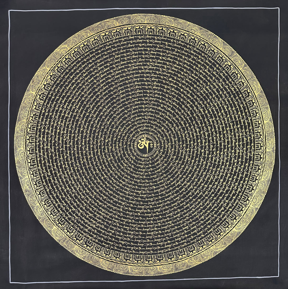 Mantra Mandala thangka, 108×108 cm: concentric rings of gold-coloured mantra script on black around a single Om