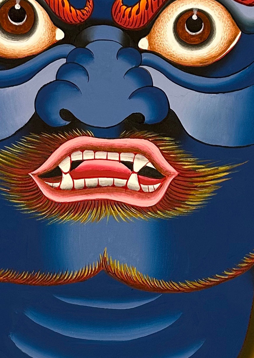 Mahakala thangka, 64×88 cm: a contemporary close-up of blue Mahakala's face with a skull crown, knife and skull cup on yellow