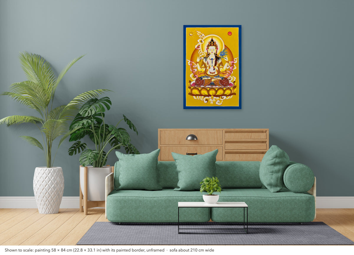 Chenrezig thangka shown to scale in a living room, unframed, above a sofa about 210 cm wide (58×84 cm)