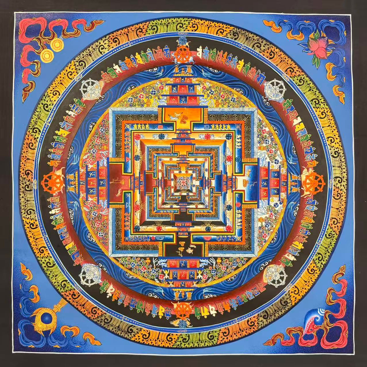 Kalachakra Mandala thangka, 55×55 cm: Kalachakra palace mandala with rings of mantra syllables and dharma wheels on a sky-blue ground