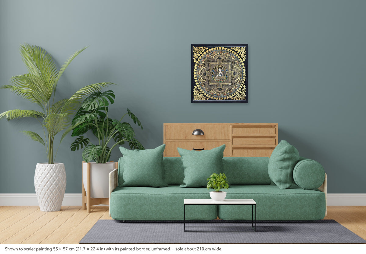 White Tara Mandala thangka shown to scale in a living room, unframed, above a sofa about 210 cm wide (55×57 cm)
