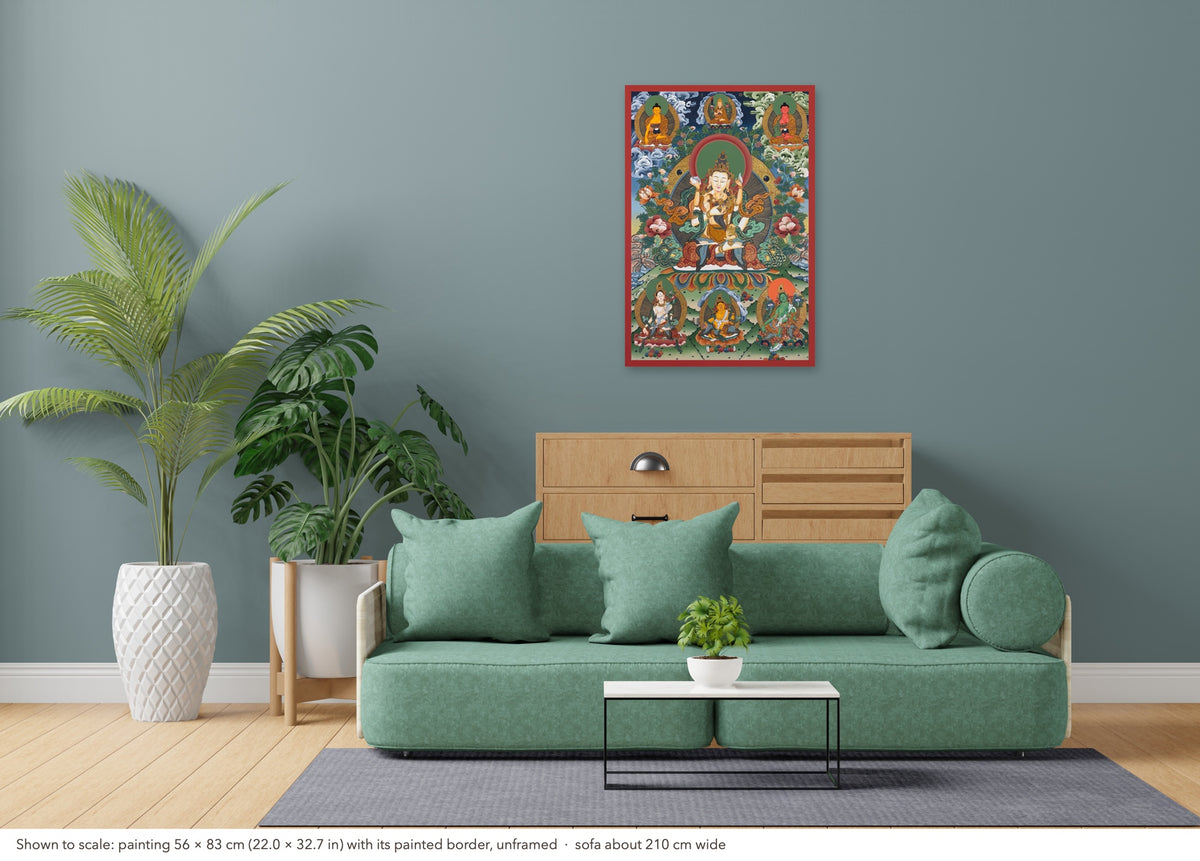 Vajrasattva with Consort thangka shown to scale in a living room, unframed, above a sofa about 210 cm wide (56×83 cm)