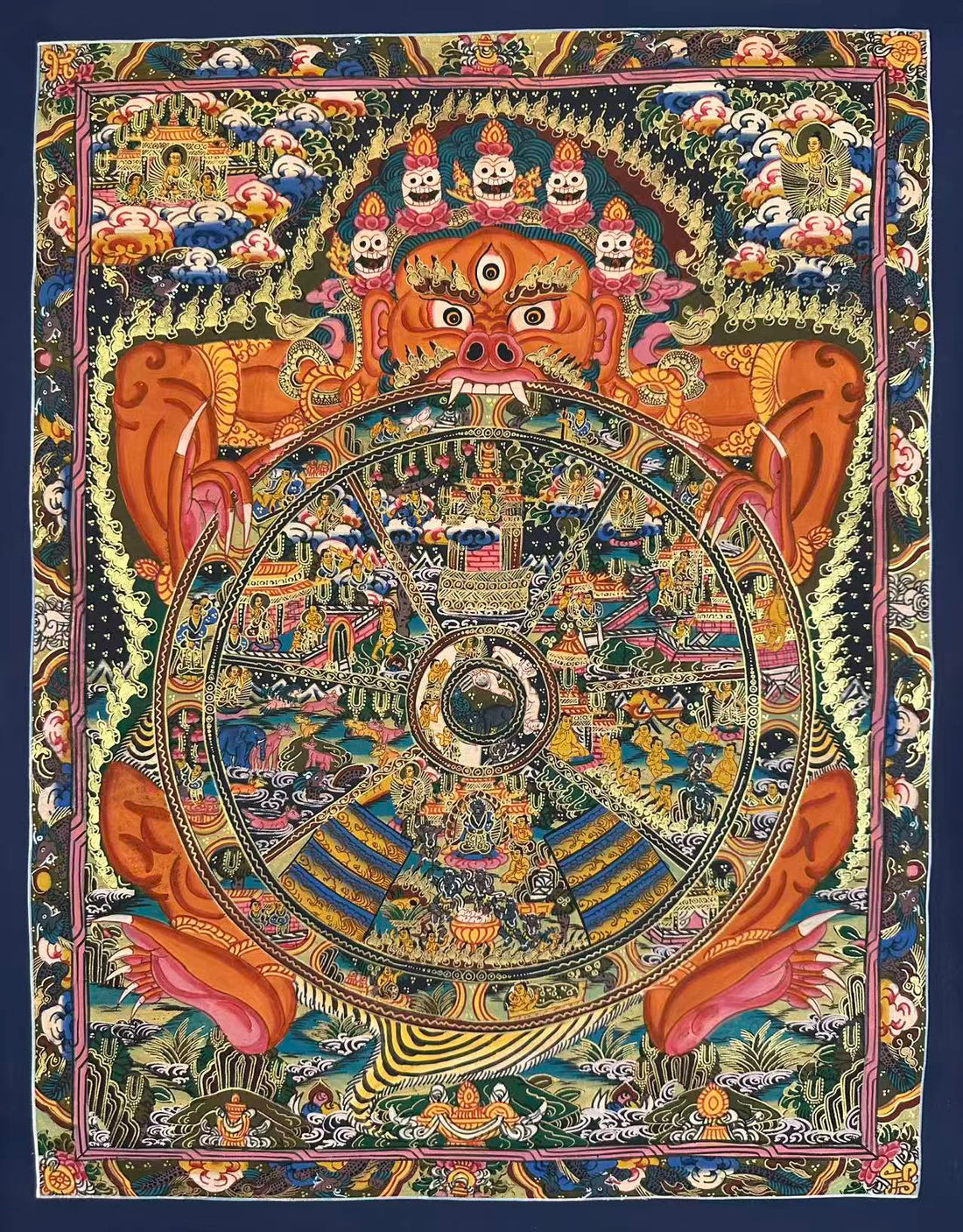 Wheel of Life thangka, 45×55 cm: orange Yama holding a densely painted Wheel of Life amid gold-coloured flames