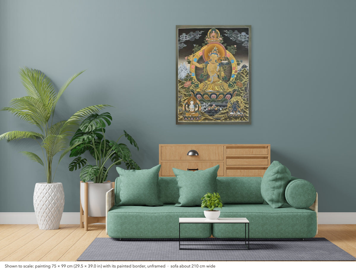 Manjushri thangka shown to scale in a living room, unframed, above a sofa about 210 cm wide (75×99 cm)
