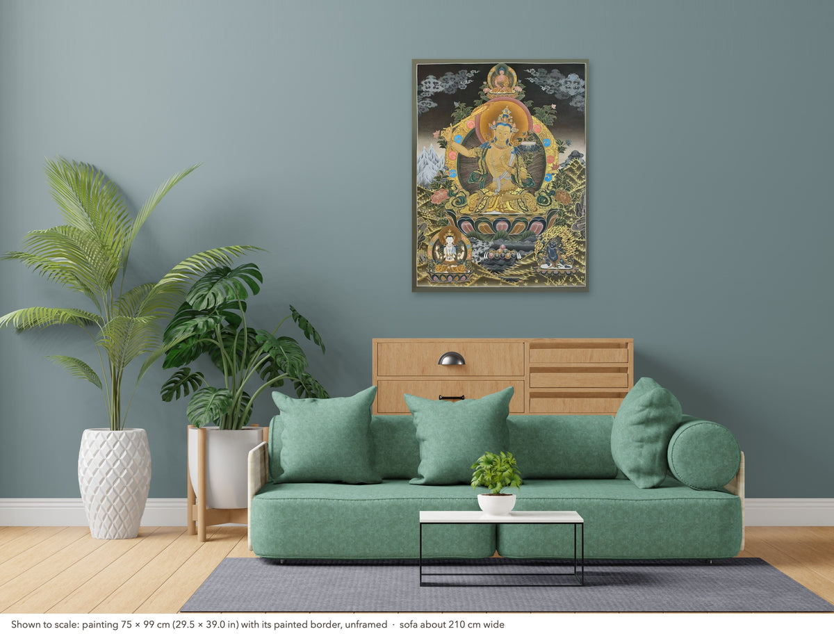 Manjushri thangka shown to scale in a living room, unframed, above a sofa about 210 cm wide (75×99 cm)