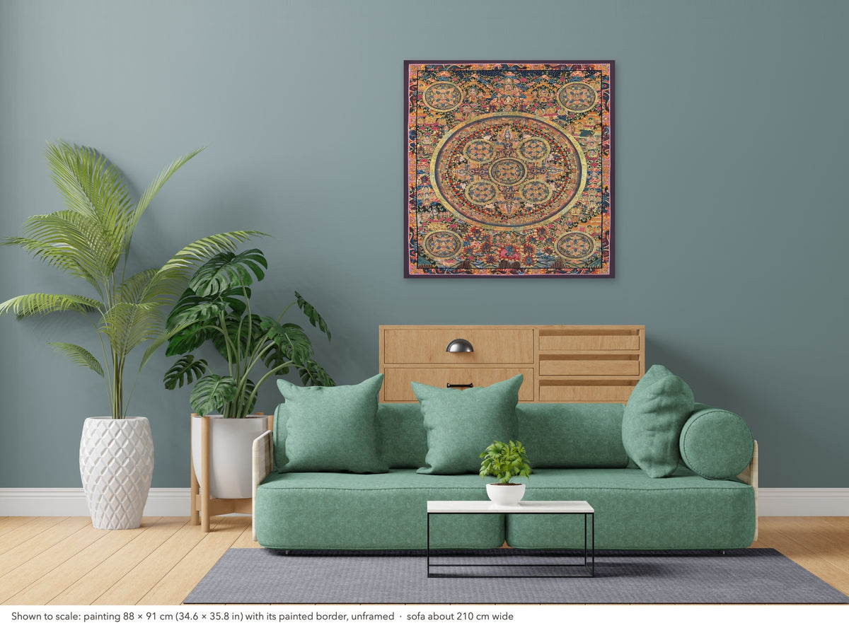 Buddha Mandala thangka shown to scale in a living room, unframed, above a sofa about 210 cm wide (88×91 cm)