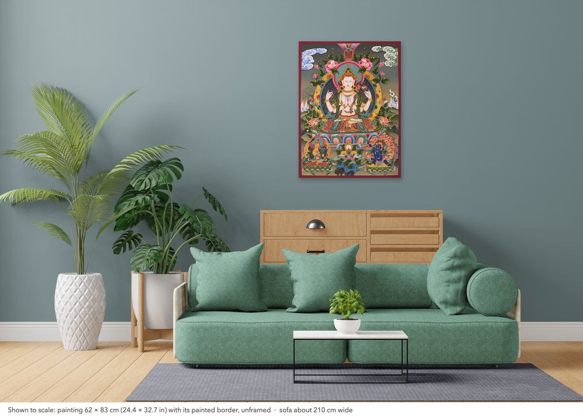 Chenrezig thangka shown to scale in a living room, unframed, above a sofa about 210 cm wide (62×83 cm)