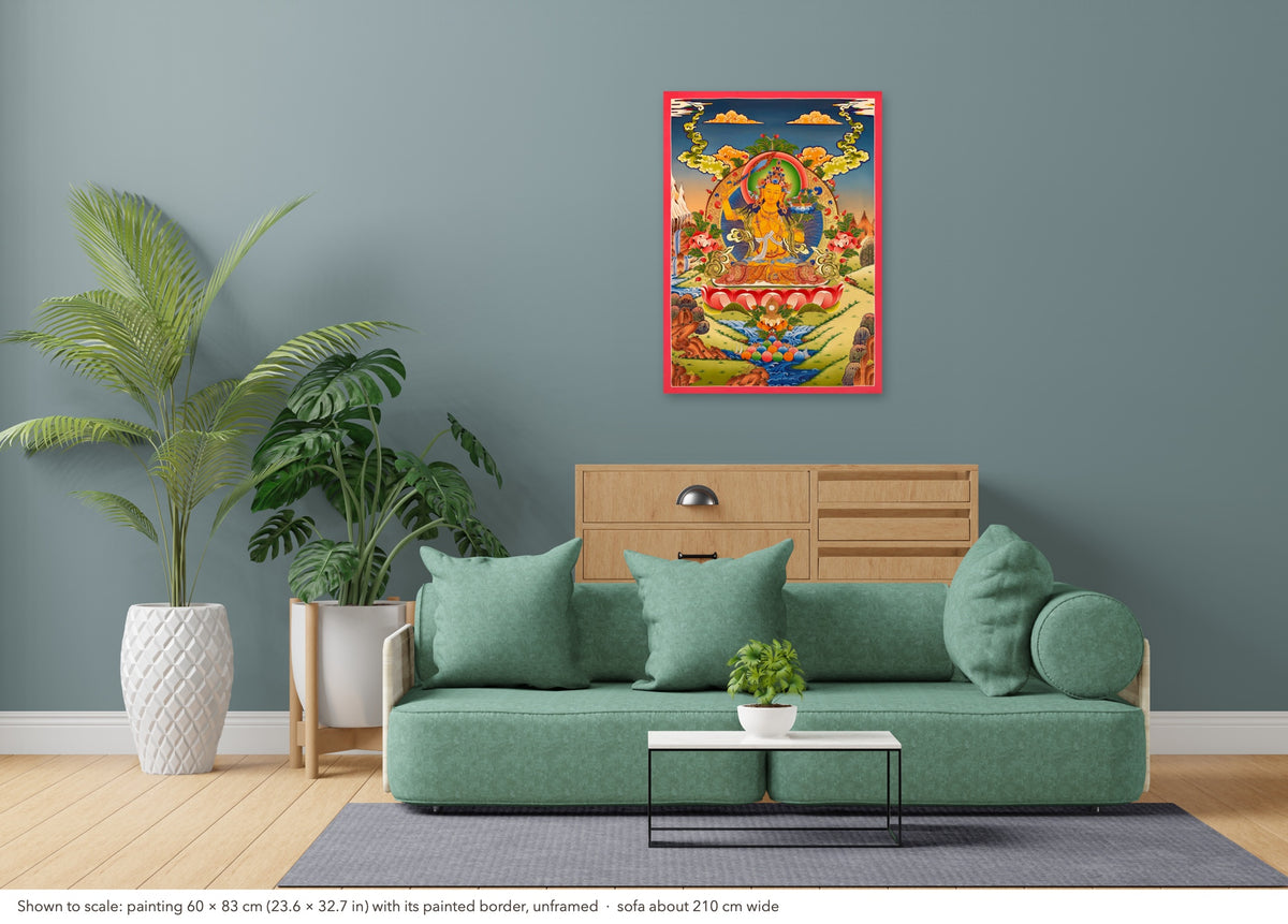 Manjushri thangka shown to scale in a living room, unframed, above a sofa about 210 cm wide (60×83 cm)