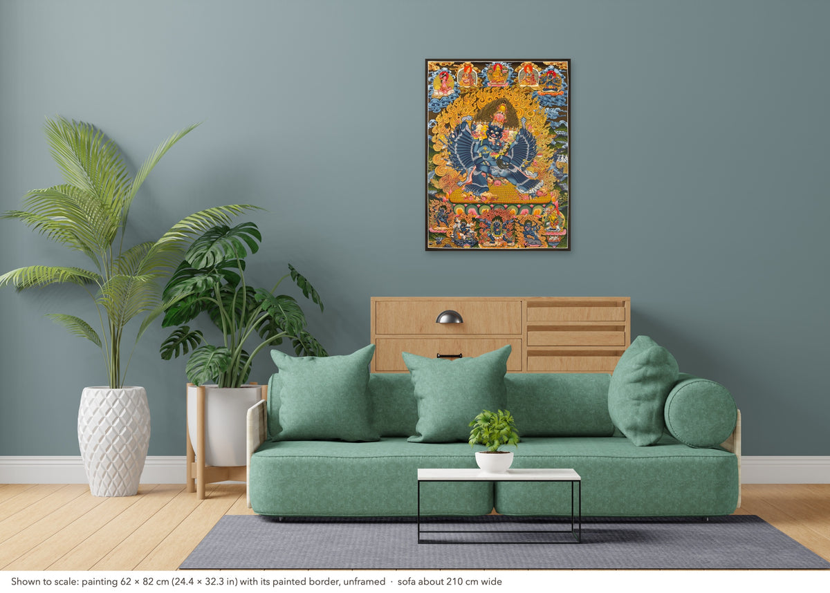 Yamantaka with Consort thangka shown to scale in a living room, unframed, above a sofa about 210 cm wide (62×82 cm)