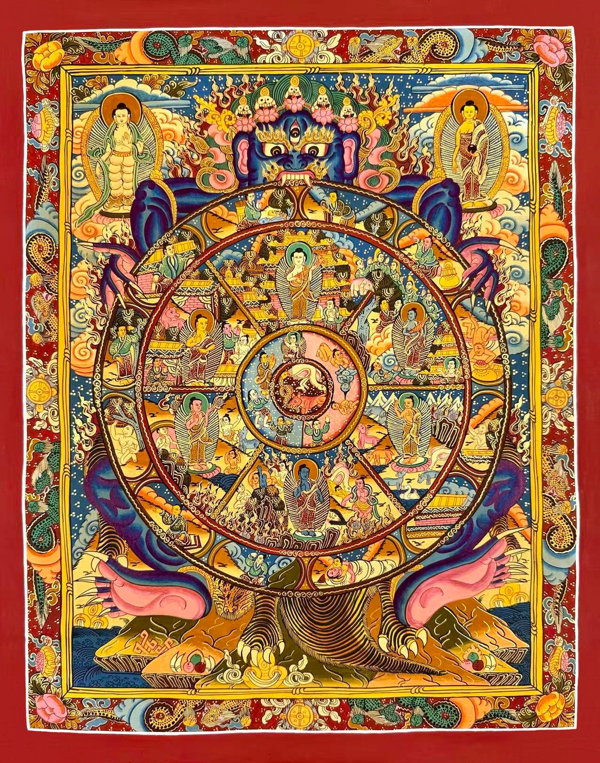 Wheel of Life thangka, 45×56 cm: blue Yama holding the Wheel of Life with a Buddha in each realm, inside a red border of dragons