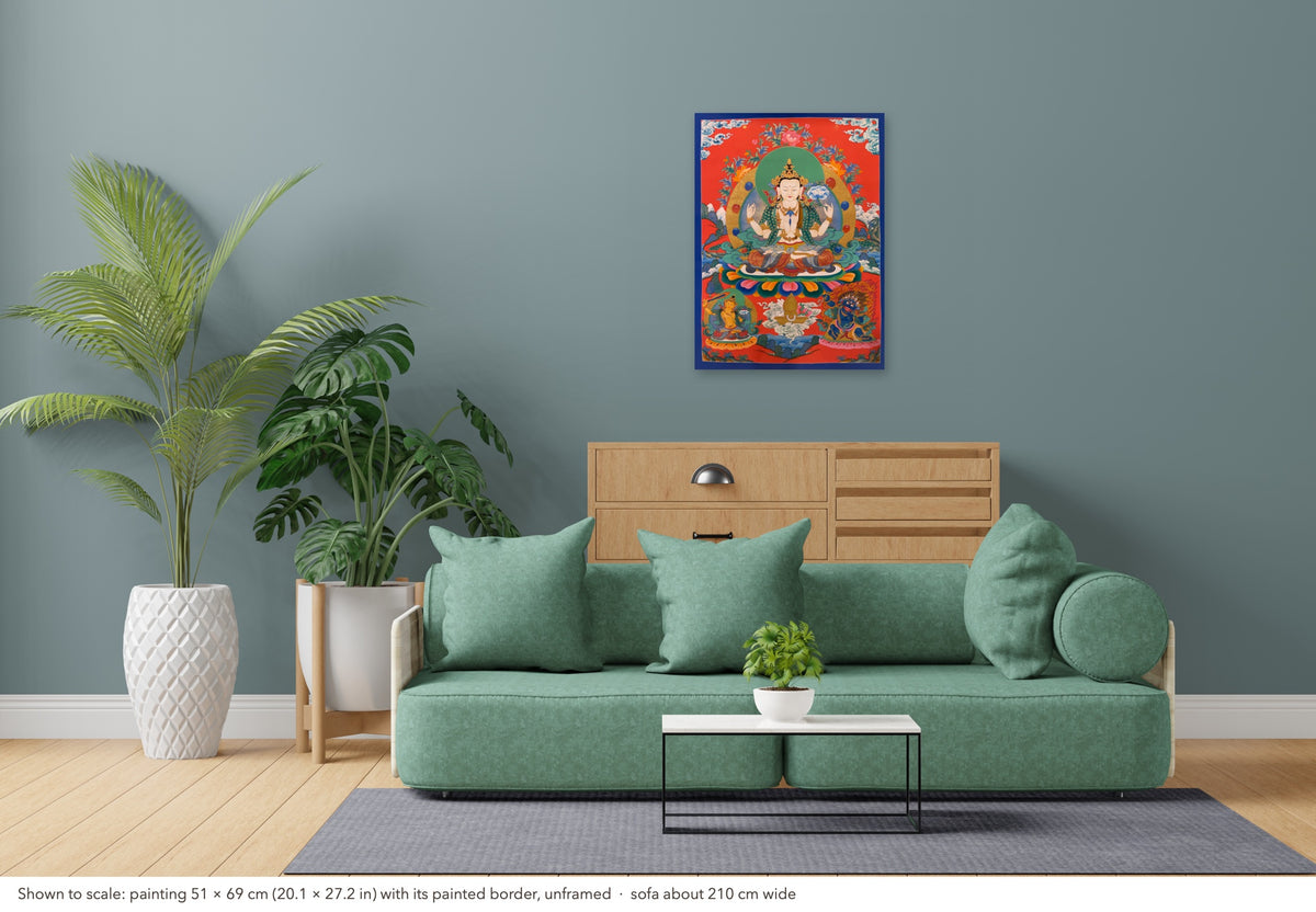 Chenrezig thangka shown to scale in a living room, unframed, above a sofa about 210 cm wide (51×69 cm)
