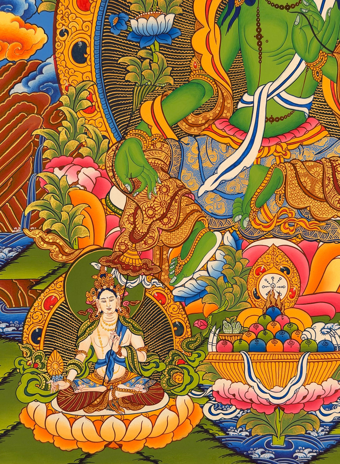 Green Tara thangka, 58×84 cm: Green Tara with the five Buddhas above and Saraswati and a white goddess with a parasol below