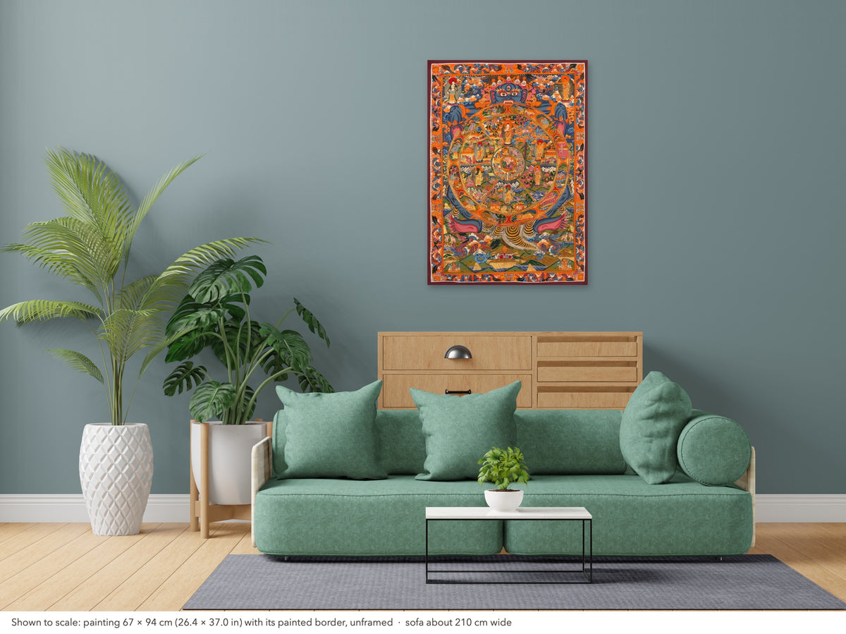 Wheel of Life thangka shown to scale in a living room, unframed, above a sofa about 210 cm wide (67×94 cm)