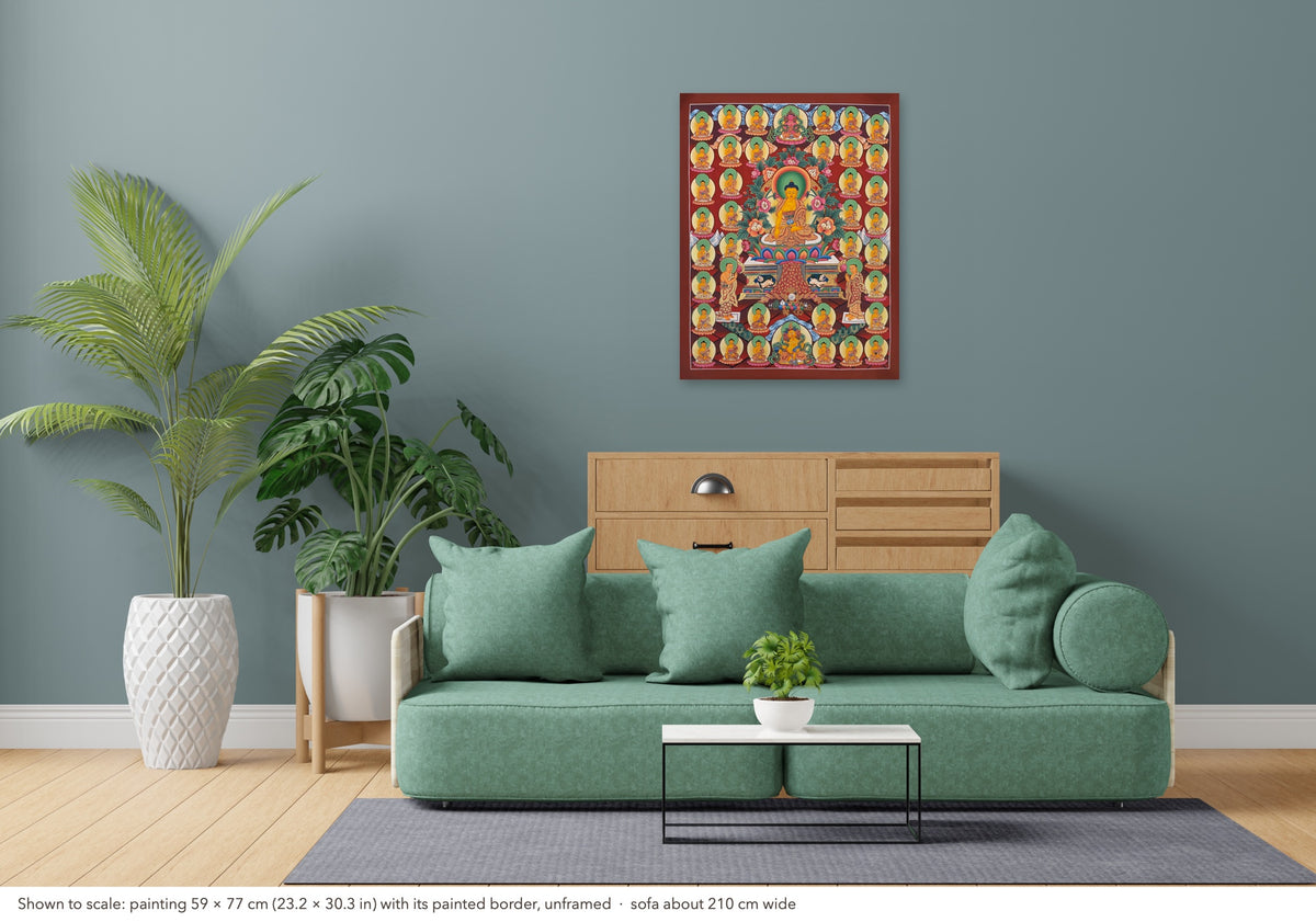 35 Confession Buddhas thangka shown to scale in a living room, unframed, above a sofa about 210 cm wide (59×77 cm)