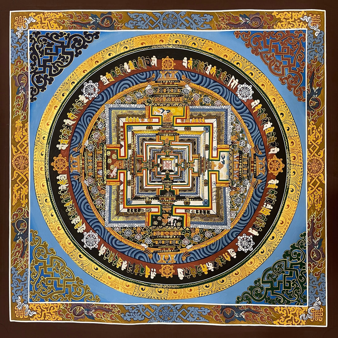 Kalachakra Mandala thangka, 55×55 cm: Kalachakra palace mandala on a sky-blue ground, inside a border of dragons