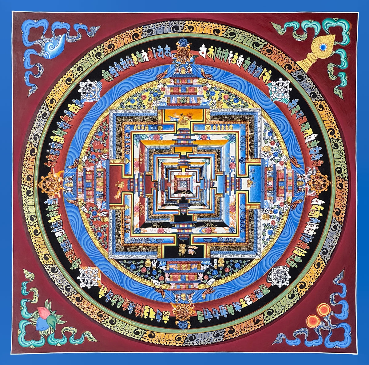 Kalachakra Mandala thangka, 47×47 cm: Kalachakra palace mandala with rings of mantra syllables and dharma wheels on a maroon ground