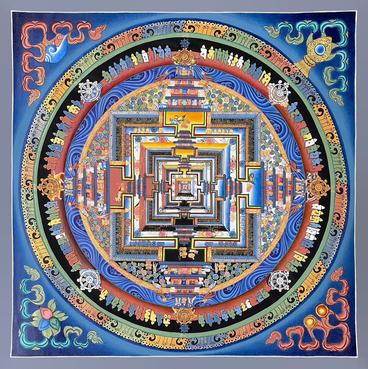 Kalachakra Mandala thangka, 47×47 cm: Kalachakra palace mandala with rings of mantra syllables and dharma wheels on a deep blue ground