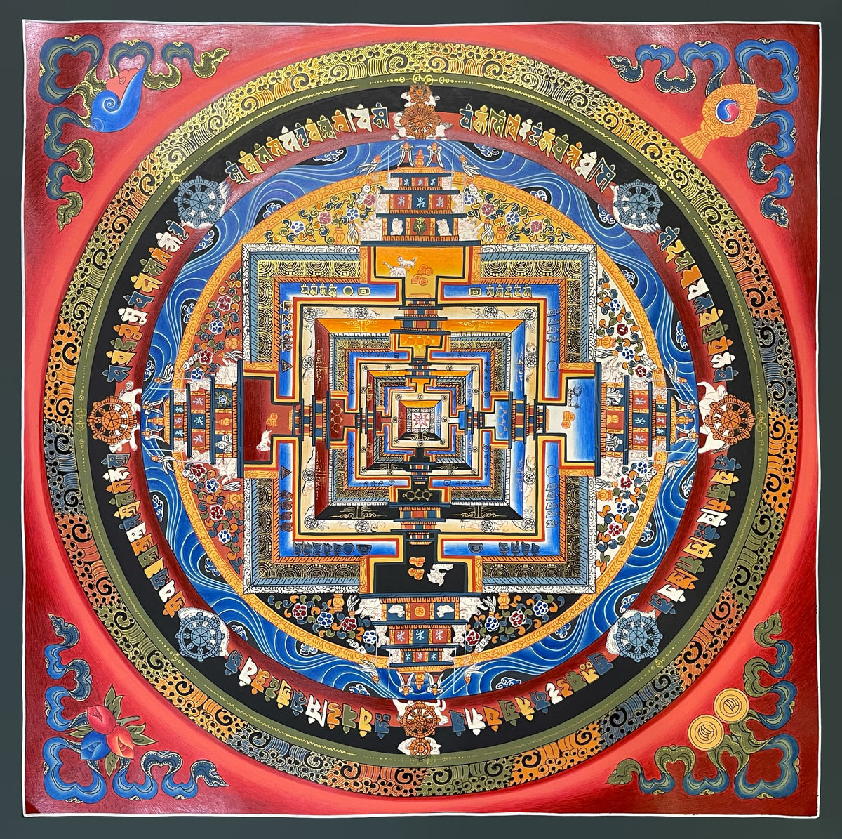 Kalachakra Mandala thangka, 55×55 cm: Kalachakra palace mandala with rings of mantra syllables and dharma wheels on a red ground