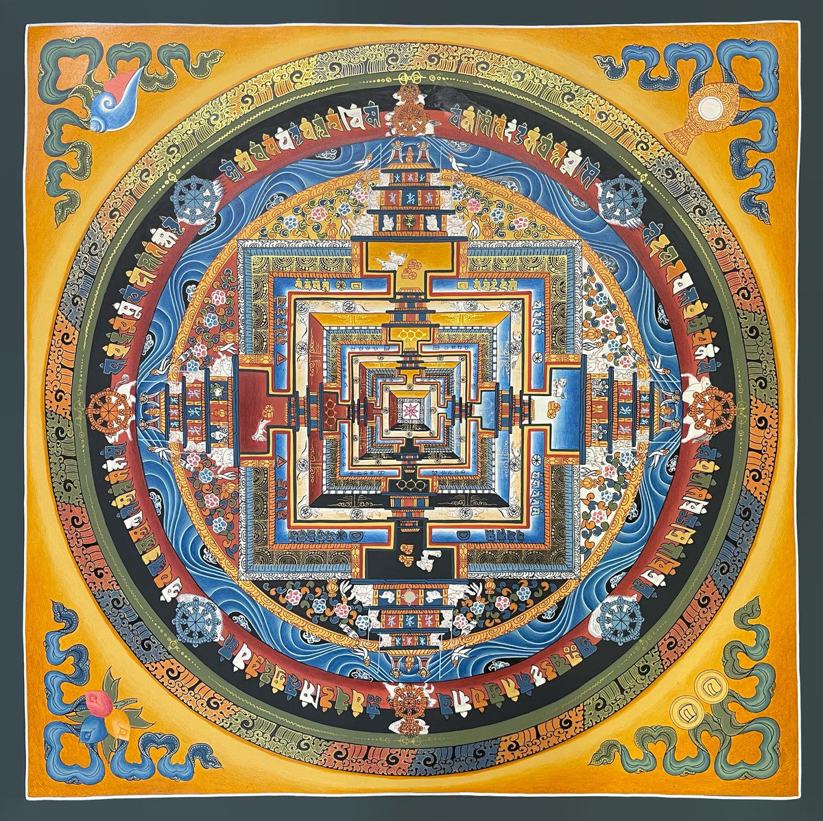 Kalachakra Mandala thangka, 55×55 cm: Kalachakra palace mandala on a golden-yellow ground, with offerings in the corners
