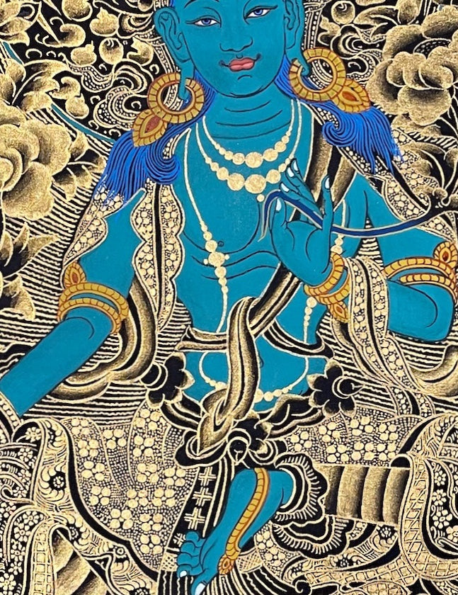 Green Tara thangka, 53×68 cm: turquoise Green Tara in black and gold, with three figures above and Saraswati below