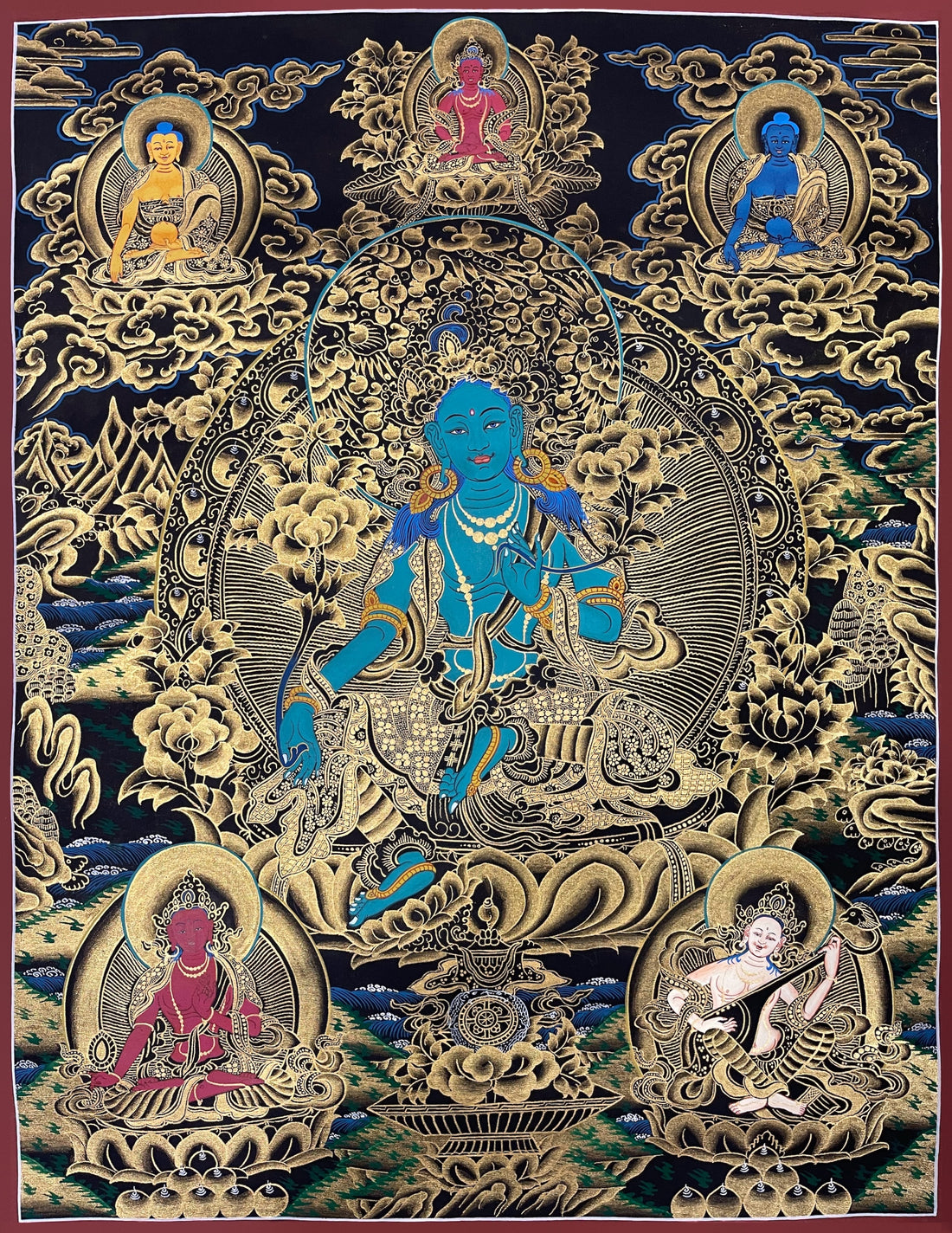 Green Tara thangka, 53×68 cm: turquoise Green Tara in black and gold, with three figures above and Saraswati below