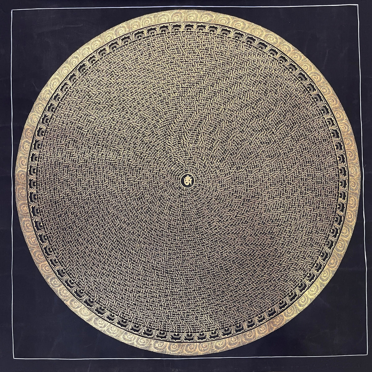 Mantra Mandala thangka, 110×110 cm: a spiral of gold-coloured mantra syllables on black around a central Om