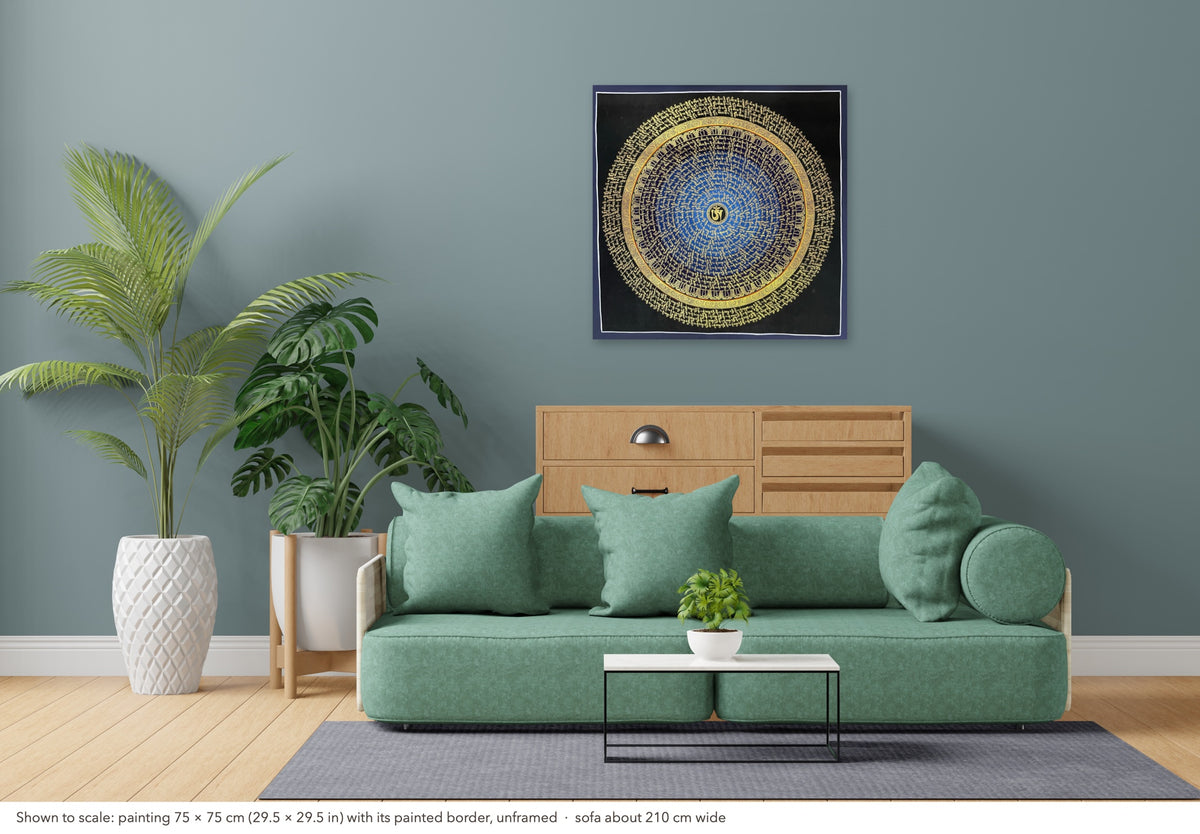 Mantra Mandala thangka shown to scale in a living room, unframed, above a sofa about 210 cm wide (75×75 cm)