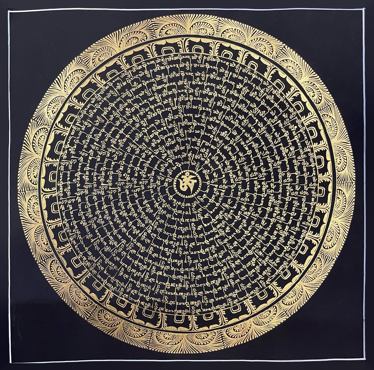 Mantra Mandala thangka, 54×54 cm: a gold-coloured Om ringed by gold-coloured mantra script on black, inside a rim of fan-like leaves